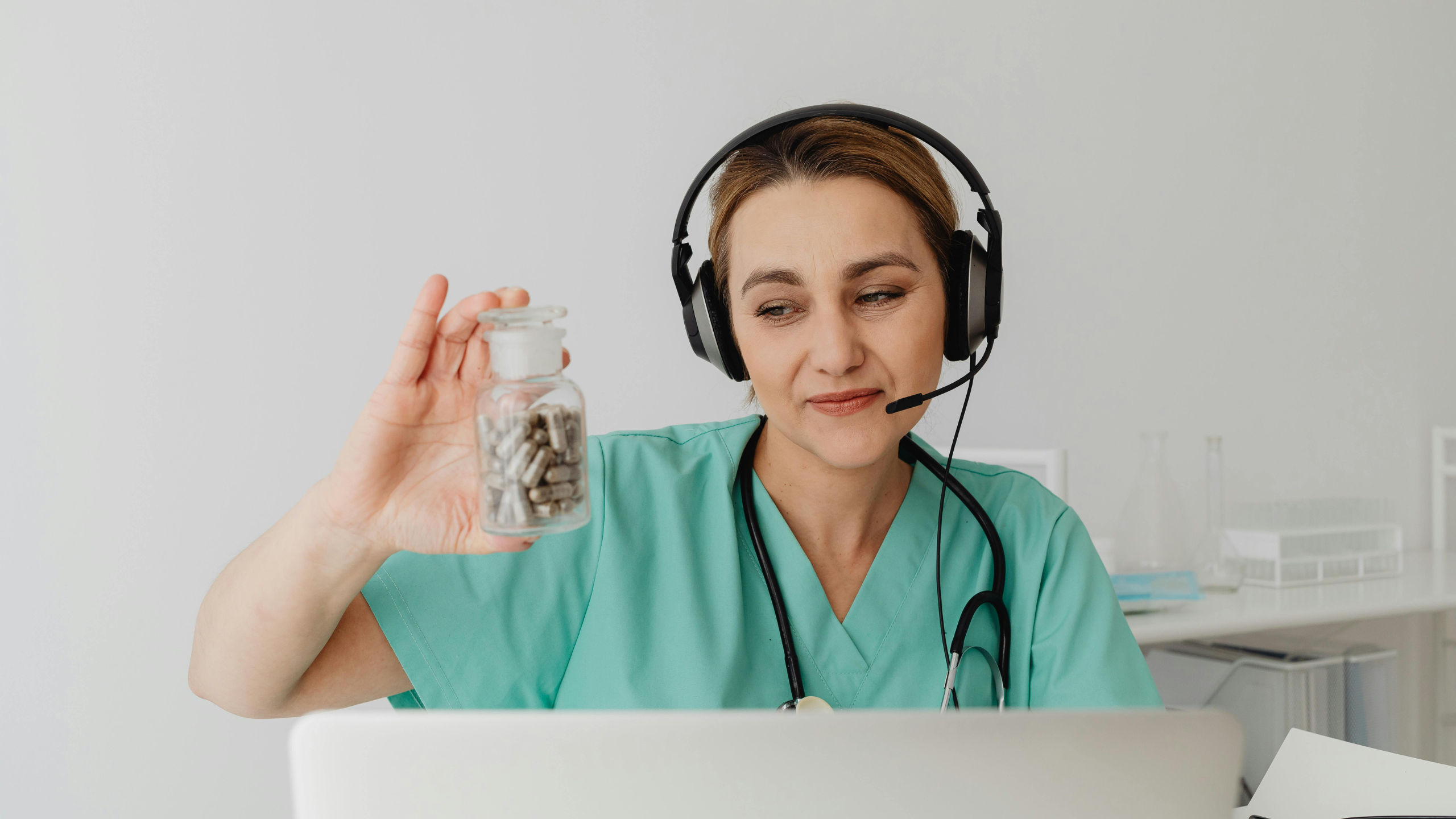 Woman using a telehealth consultation from home