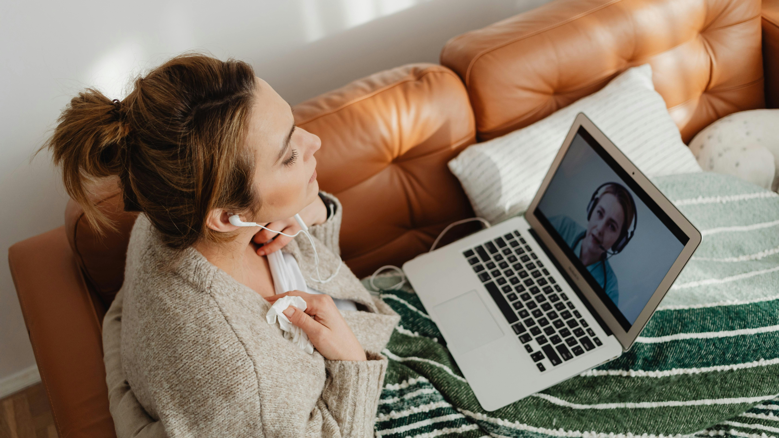 Woman discussing healthcare options with a provider online